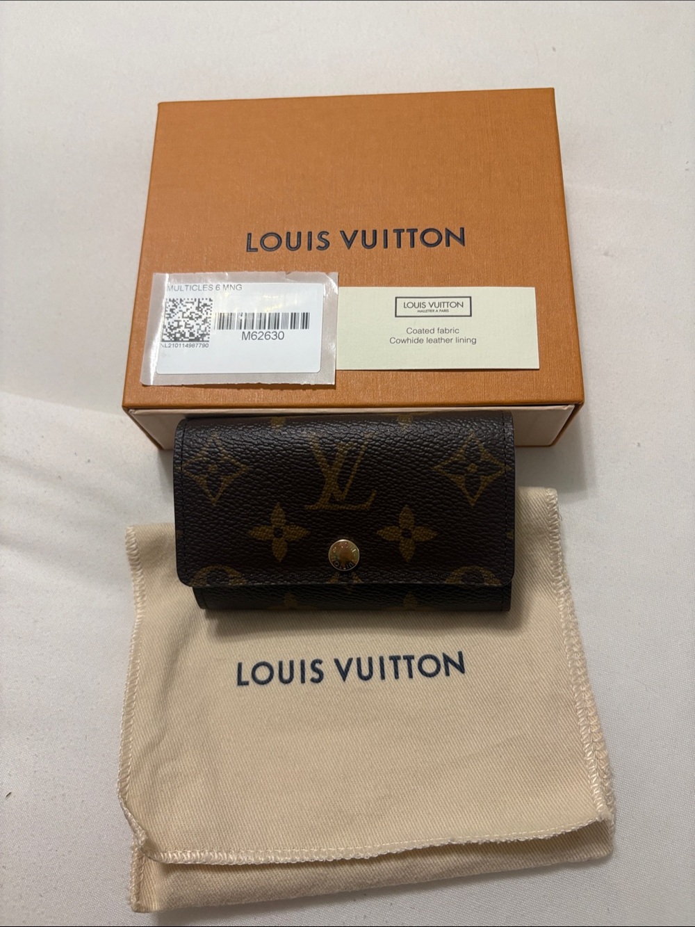 Authentic 6 Key Holder Louis Vuitton Brown Monogram Canvas